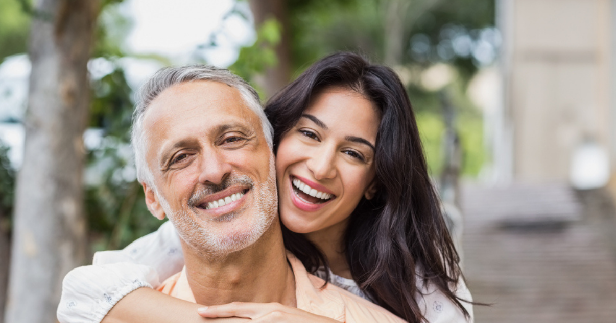 Attractive couple happy with their decision of leaving the Hair Club