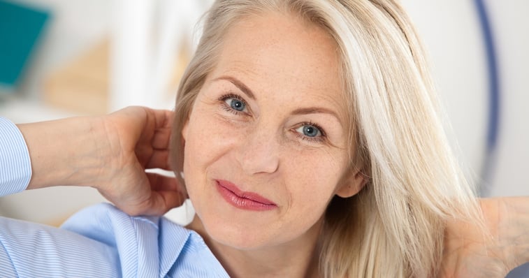 middle aged blonde woman smiling