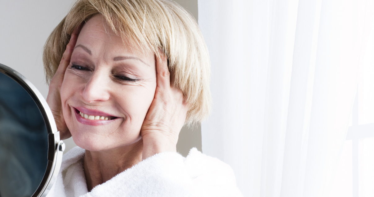 mature woman happy with DIY hair system maintenance