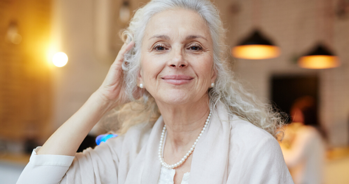 mature woman enjoying her new hair system style