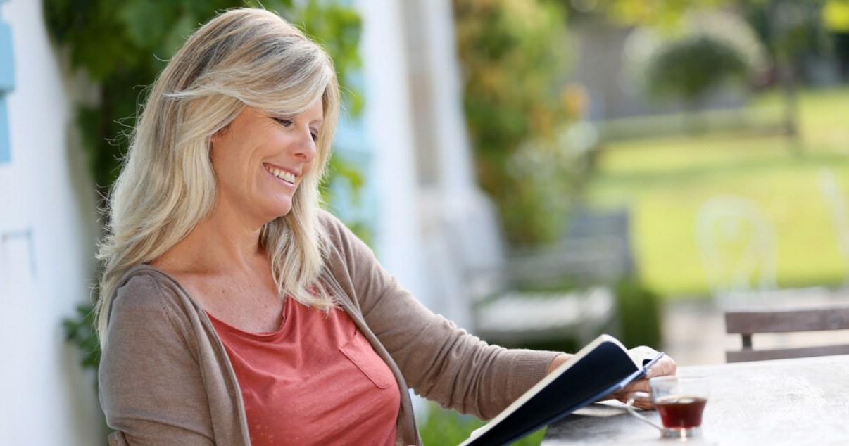 Mature woman who repaired her hair system at home using hair system maintenance practices