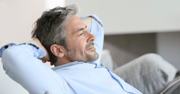 mature man wearing hairpiece cleaned using hairpiece maintenance techniques 