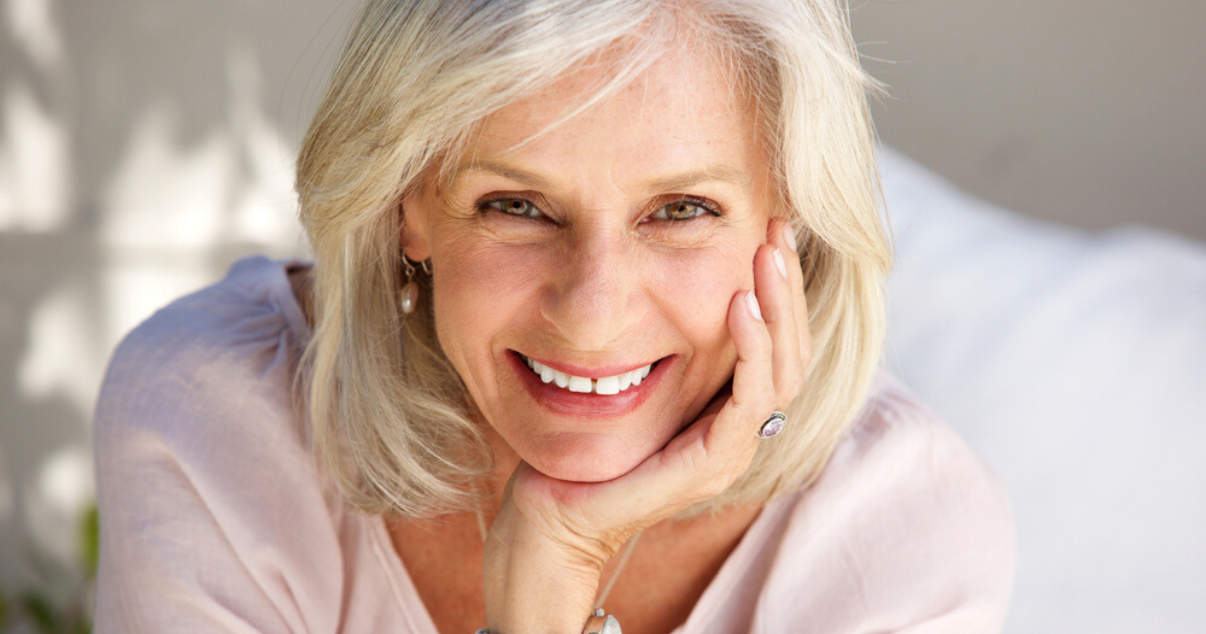 Woman wearing hair system with easy hairpiece care (1)