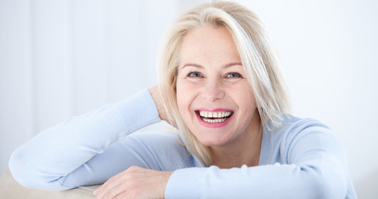 Middle aged woman wearing best stock hairpiece