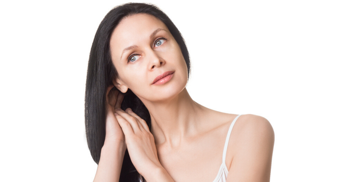 Woman practicing good hair system maintenance