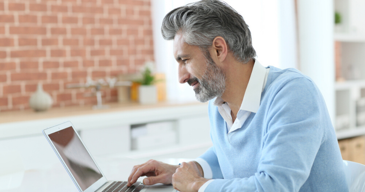 Mature man learning how to extend his hair system lifespan