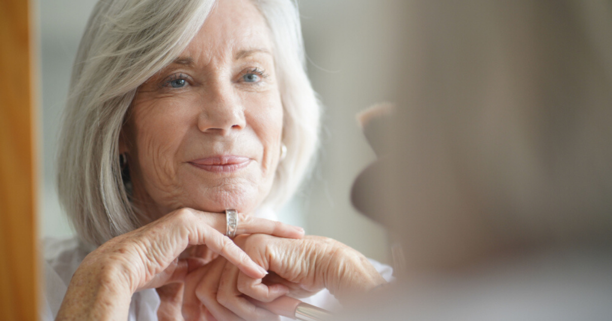 Senior woman looking after hair system lifespan