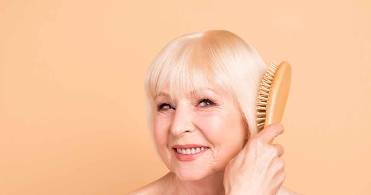 Senior woman with good hairpiece care