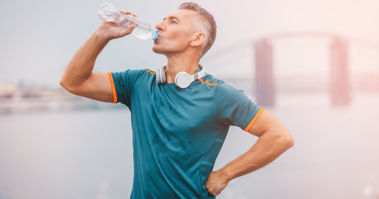 mature man wearing hair system while going for a run