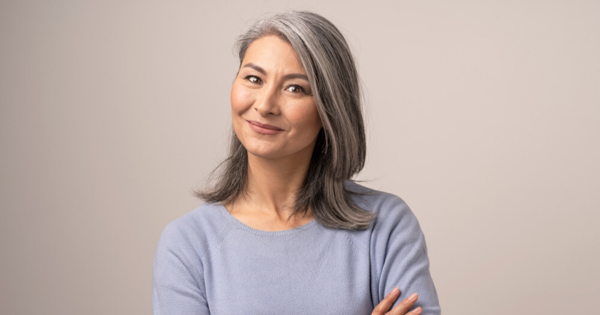 Senior woman wearing hair system over extended period of time