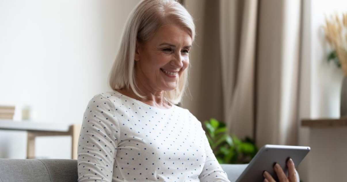 Woman looking at Advent hair systems online