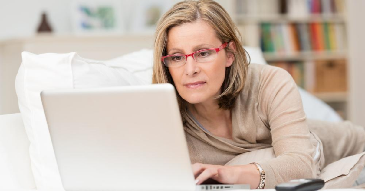 middle aged woman looking to buy hair system online