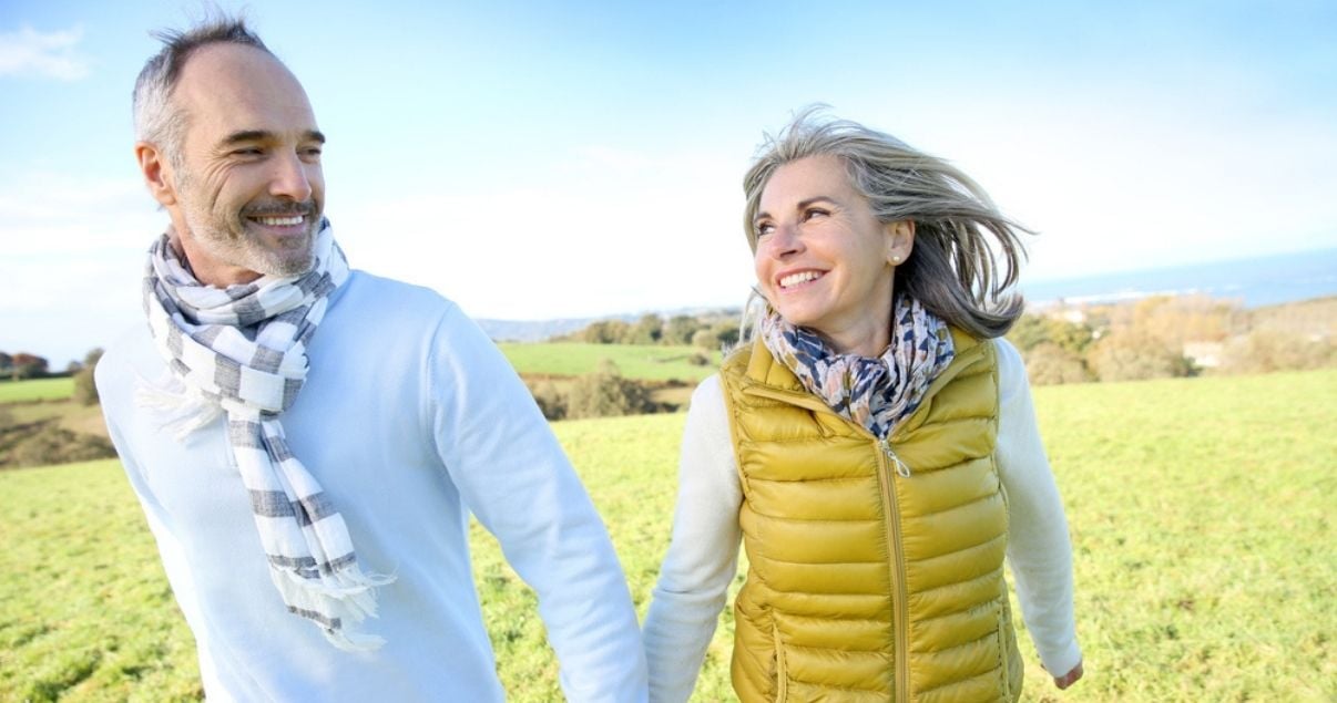 older couple with good hairpiece maintenance in the winter