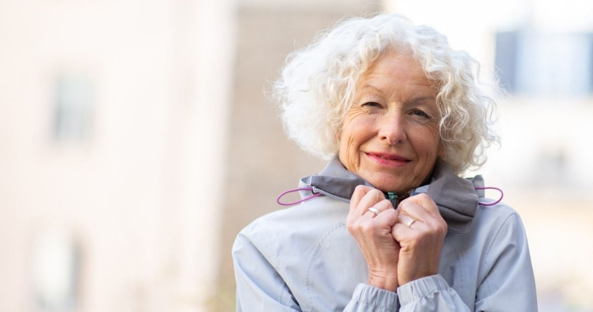 older woman with good winter hairpiece maintenance 