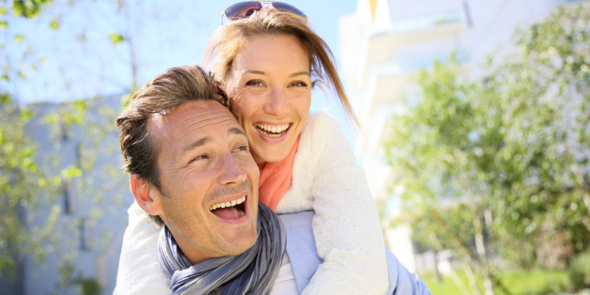 Handsome couple happy with their hair replacement