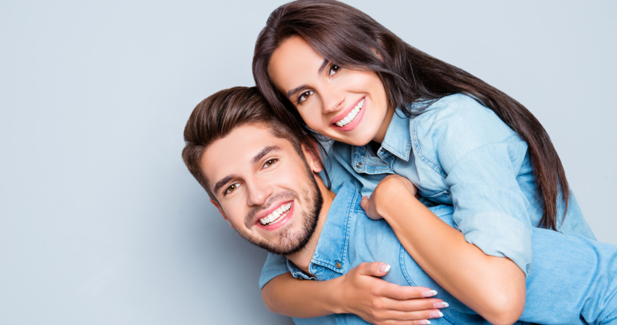 Happy couple wearing each a hairpiece (1)