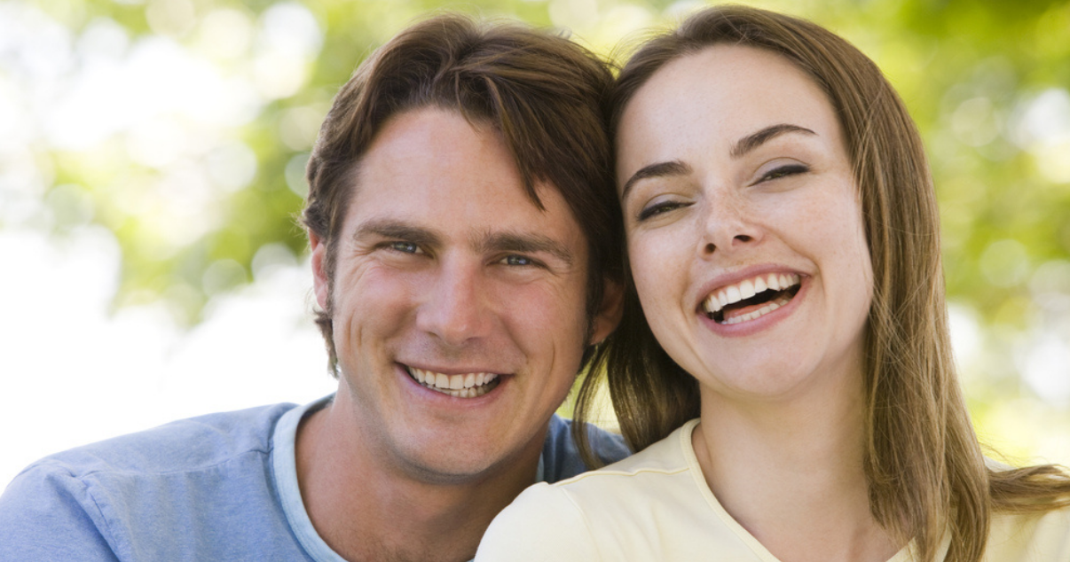 Happy couple who have comb over their hairpieces