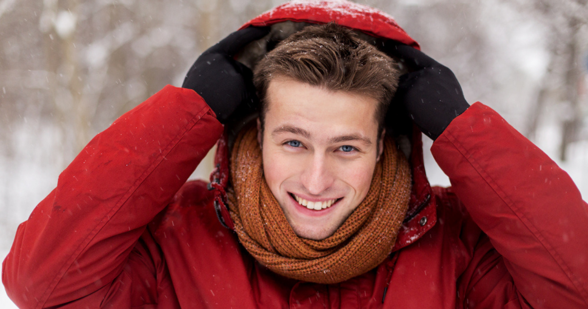 Happy man enjoying his Hair system in the winter