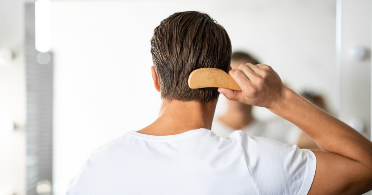 Man combing over his hair