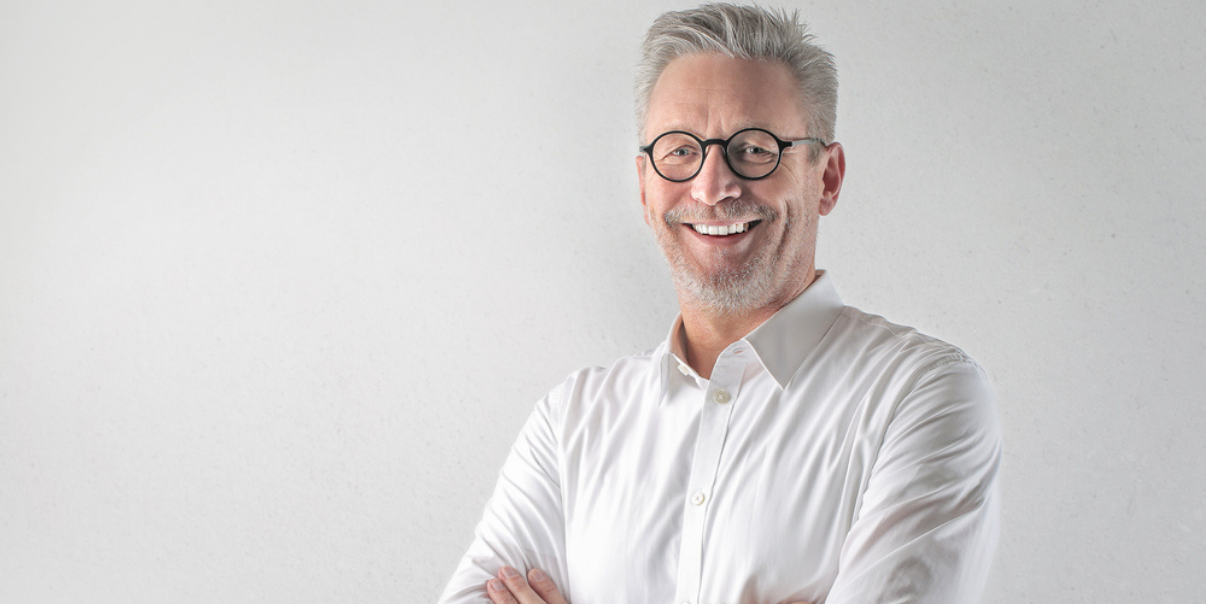 Man happy because he doesnt have to worry about his hair replacement