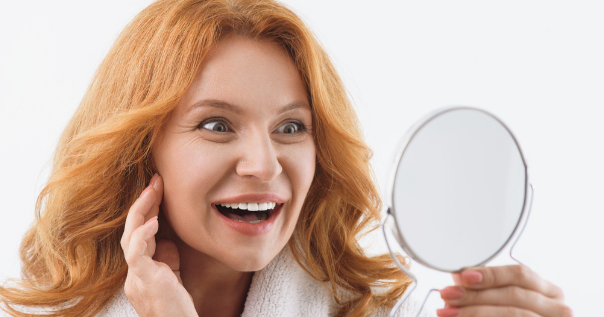 Mature woman happy with her soft and silky hairpiece