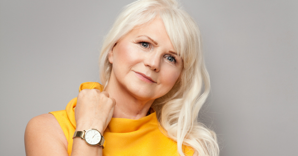 Mature woman wearing natural hair wig