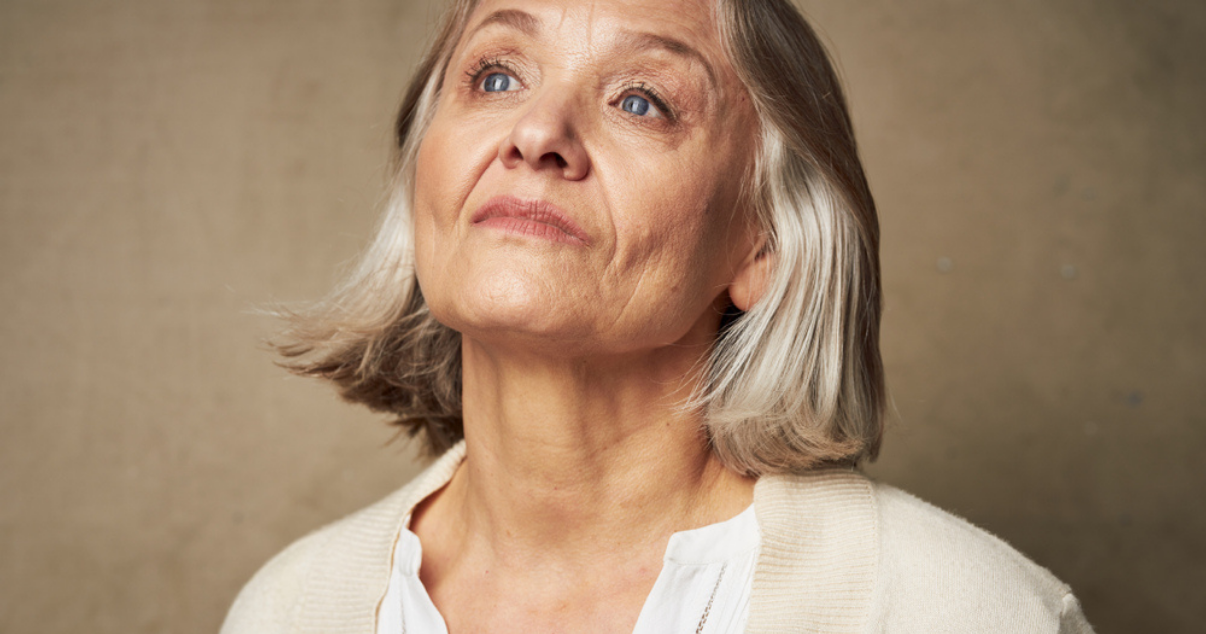 Mature woman with DIY hair system care