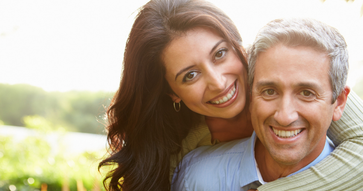 Middle age couple happy with how they combed over their hair