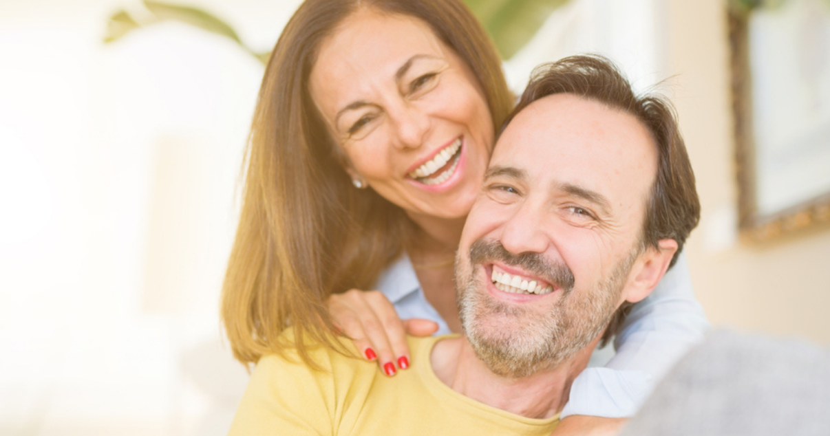 Middle age couple happy with their hairpieces (1)