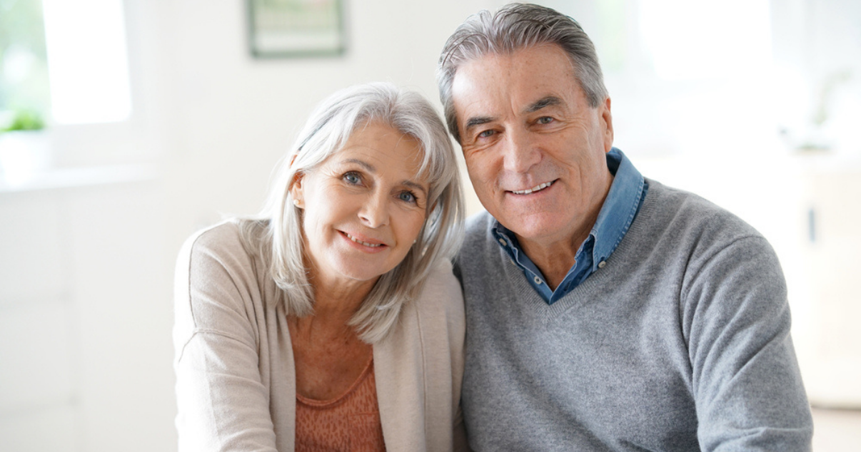 Middle aged couple enjoying their new hair system