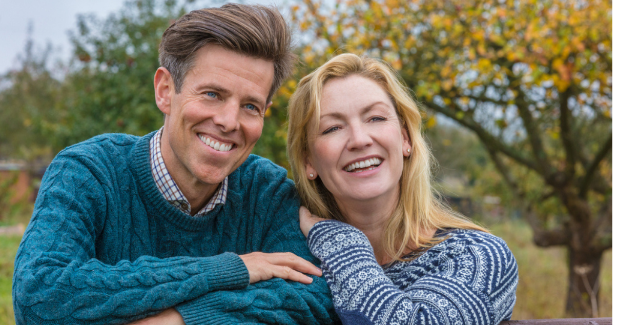 Middle aged couple happy with their hairpieces