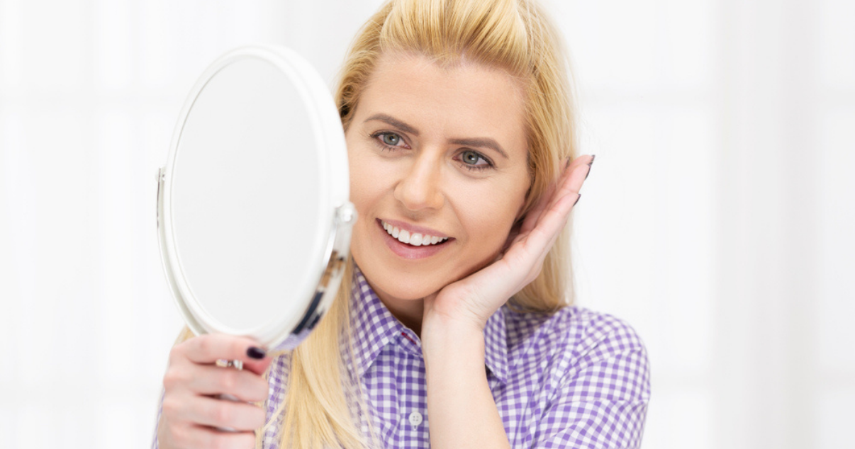 Middle aged woman with DIY hairpiece attachment