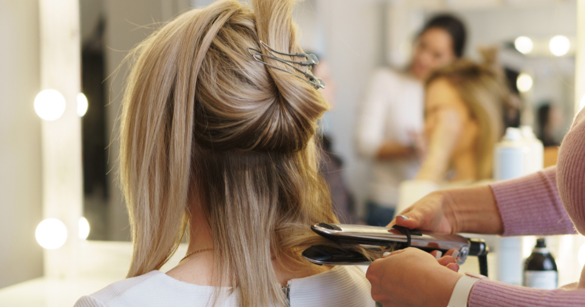 Woman getting ready with a lovely summer hairstyle