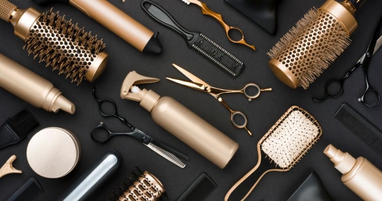 gold hair styling tool on table