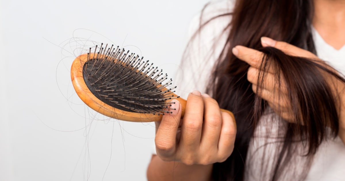 Woman experiencing hair loss