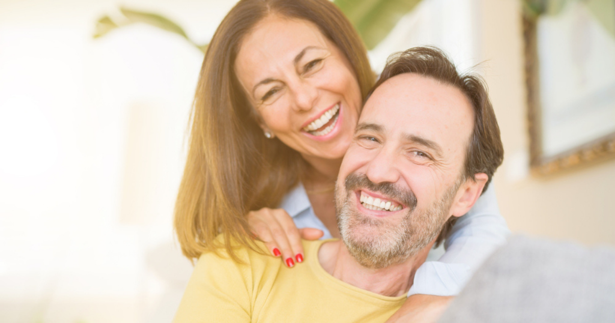 Beautiful couple happy that they dont have to go anymore to the hair salon 