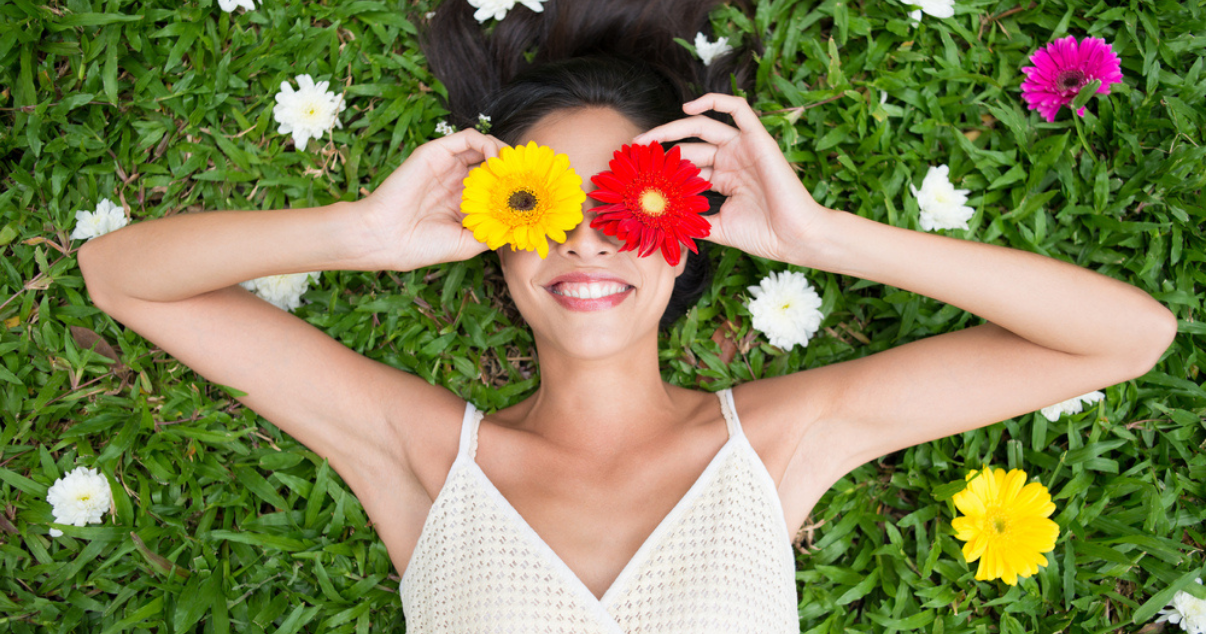 Woman enjoying their hair pieces in the spring